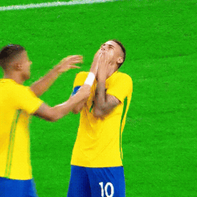 Two Soccer Players Are Hugging And One Has The Name Rafael On The Back Of His Jersey GIF