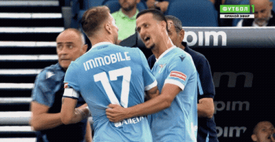 Two Soccer Players Are Hugging And One Has The Number 17 On His Back GIF