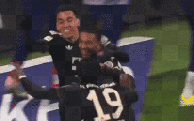 Two Soccer Players Are Hugging Each Other And One Has The Number 1 On His Shirt GIF