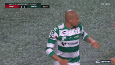 Two Soccer Players Are Hugging Each Other On A Field With Fox Deportes In The Upper Left Corner GIF