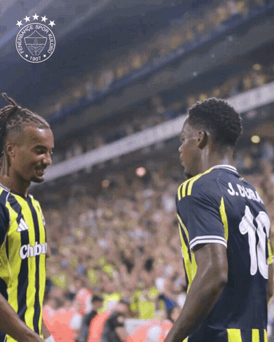 Two Soccer Players Are Shaking Hands In Front Of A Logo That Says Fenerbahce GIF