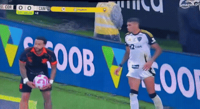 Two Soccer Players Are Standing In Front Of A Banner That Says ' Coop ' On It GIF