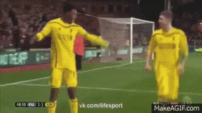 Two Soccer Players Are Standing On A Field With A Makeagif.com Website In The Corner GIF