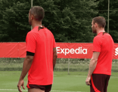 Two Soccer Players By Expedia Sign GIF