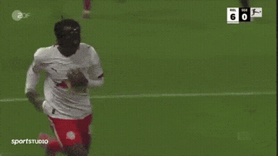 Two Soccer Players Celebrating Goal In Red Bull Jerseys GIF