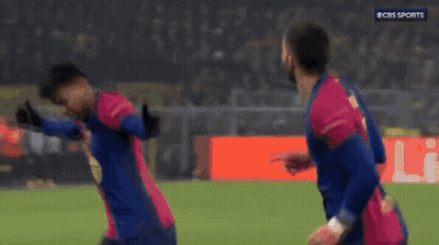 Two Soccer Players Celebrating Goal GIF