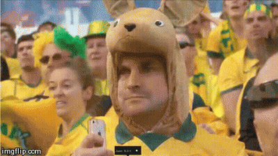 Two Soccer Players Celebrating Goal With Live FC Logo GIF