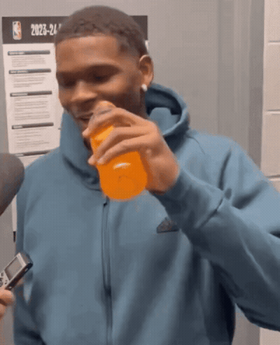Two Soccer Players During Half Time GIF