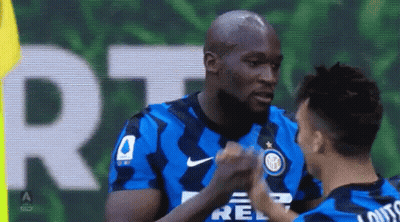 Two Soccer Players Fist Bump GIF