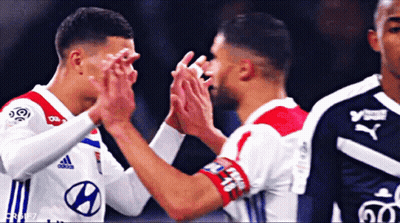 Two Soccer Players High Five One In Hyundai Jersey GIF