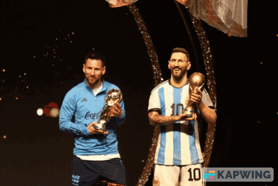 Two Soccer Players Holding Trophies Number 10 GIF
