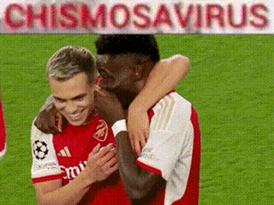 Two Soccer Players Hugging GIF