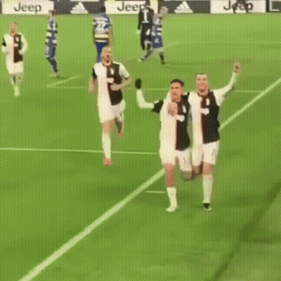 Two Soccer Players Hugging GIF