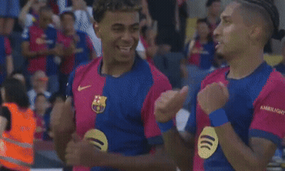 Two Soccer Players Hugging GIF