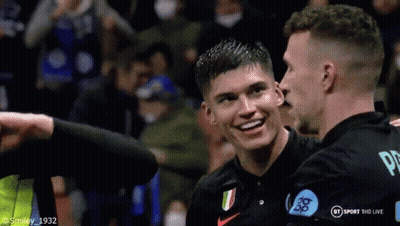 Two Soccer Players Hugging And Smiling GIF