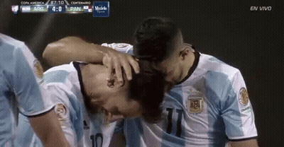 Two Soccer Players Hugging Argentina Vs Panama GIF