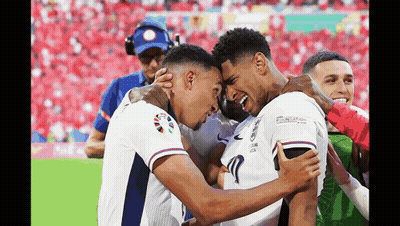 Two Soccer Players Hugging GIF