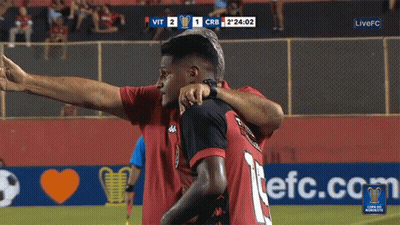Two Soccer Players Hugging LiveFC Banner GIF