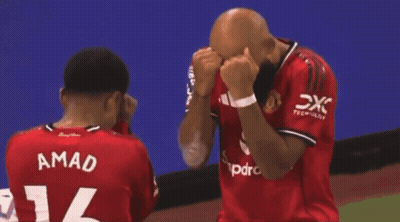 Two Soccer Players Hugging Number 16 GIF