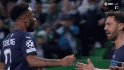 Two Soccer Players Hugging On Field GIF
