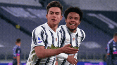Two Soccer Players Hugging GIF