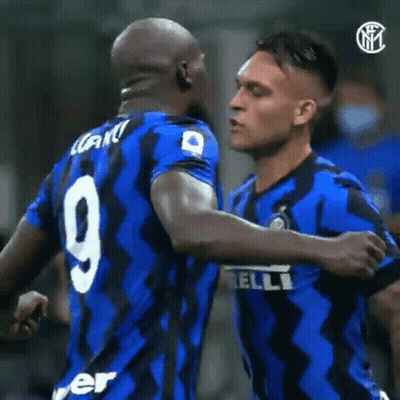 Two Soccer Players Hugging GIF