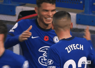 Two Soccer Players Hugging Ziyach Jersey GIF