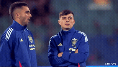 Two Soccer Players In Blue Adidas Jackets GIF