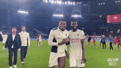 Two Soccer Players In Emirates Fly Better Jerseys Posing GIF