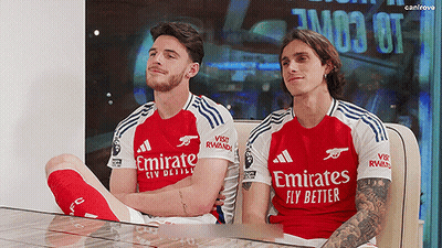 Two Soccer Players In Emirates Jerseys GIF