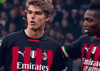 Two Soccer Players In Emirates Jerseys GIF
