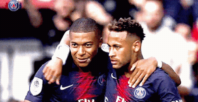 Two Soccer Players In Fly Emirates Jerseys GIF
