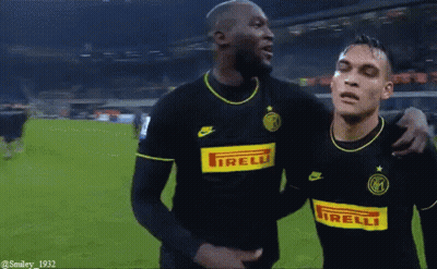 Two Soccer Players In Nike And Irelli Jerseys GIF