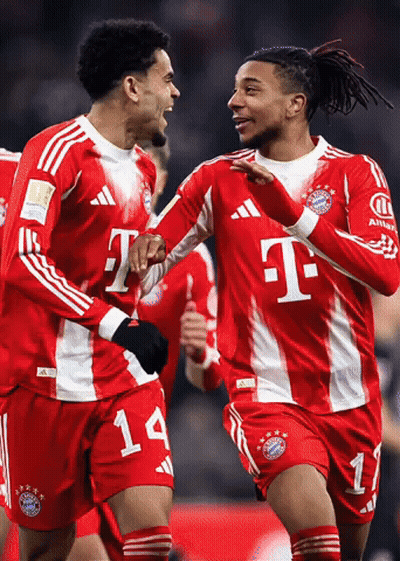 Two Soccer Players In Red And White T-Mobile Jerseys GIF