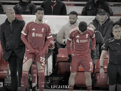 Two Soccer Players In Red Jersey Standard Chartered GIF
