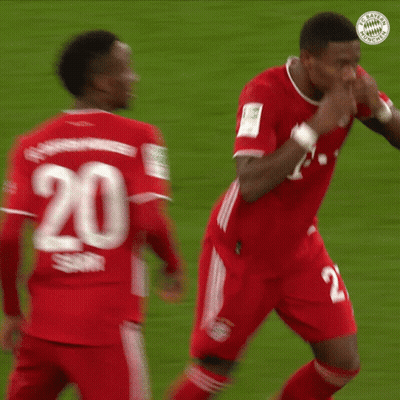 Two Soccer Players In Red Jerseys Number 20 GIF