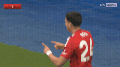 Two Soccer Players In Red Jerseys Number 7 And 24 GIF
