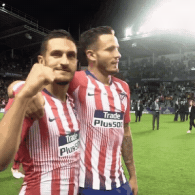Two Soccer Players In Red White Blue Striped Jerseys With Trade Plus500 GIF