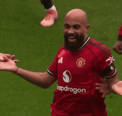 Two Soccer Players In Snapdragon Jerseys GIF