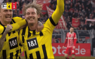 Two Soccer Players In Yellow And Black Jerseys 1 & 1 GIF