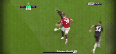 Two Soccer Players Laying On Field, One With Emirates GIF