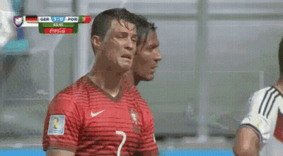 Two Soccer Players Next To Coca Cola Scoreboard GIF