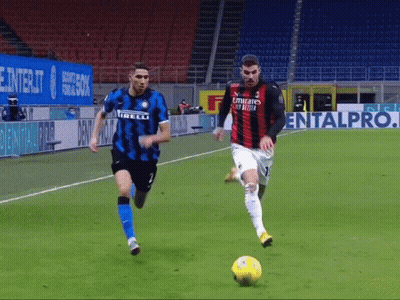 Two Soccer Players On A Field One Of Whom Is Wearing An Emirates Fly Better Jersey GIF