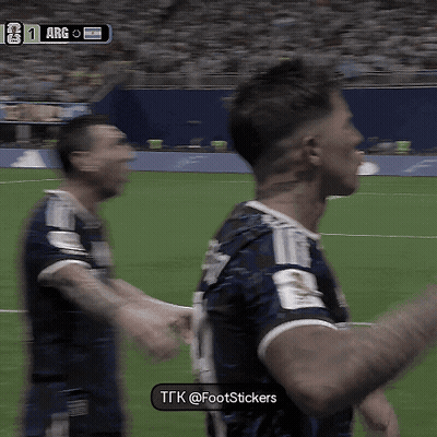 Two Soccer Players On A Field With A Scoreboard That Says Arg GIF
