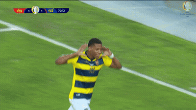 Two Soccer Players On A Field With A Scoreboard That Says Ecu At The Top GIF