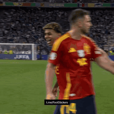 Two Soccer Players On A Field With A T.me/footstickers Sign GIF