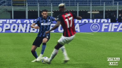 Two Soccer Players On A Field With Ea Sports Advertisements In The Background GIF