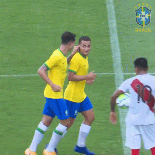 Two Soccer Players On A Field With The Word Brasil On The Bottom Right GIF