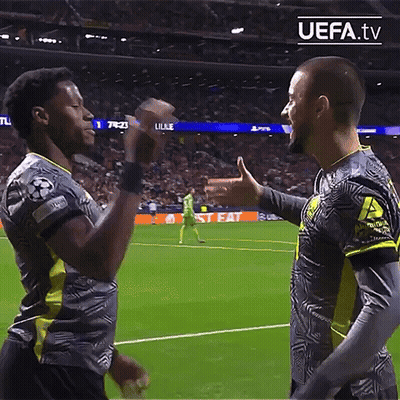 Two Soccer Players On A Field With Uefa.tv Written On The Bottom Right GIF