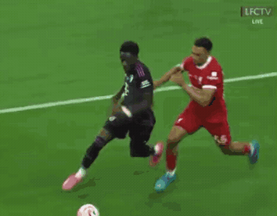 Two Soccer Players On Field Sponsored By LFCTV GIF